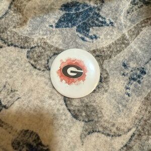 White and Red Button with Georgia Logo